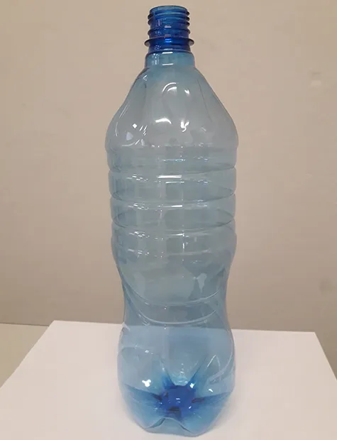 Empty 1.5 litre blue PET bottle without a cap