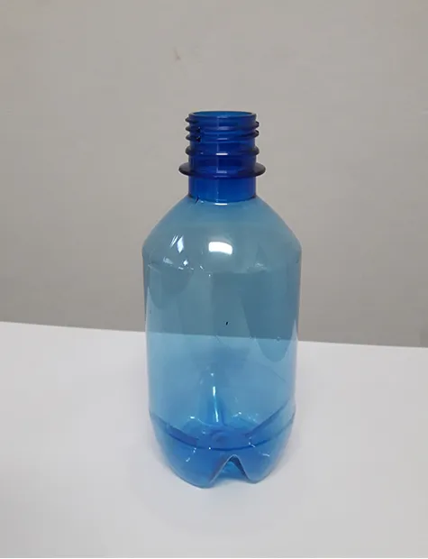 Empty 330ml blue PET bottle without a cap